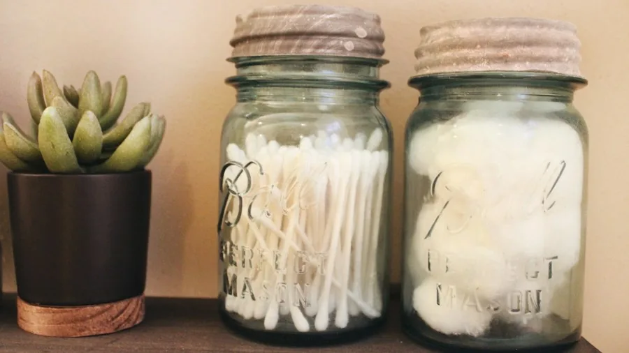 7 Tips for Upcycling Pickle Jars Into Stylish Bathroom Countertop Storage 3 bathroom cotton ball storage containers