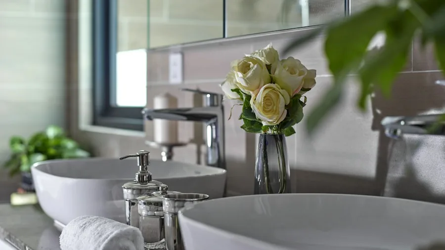 Vintage Pitcher and Basin Sets Make a Comeback as Bathroom and Kitchen Decor 2 ceramic pitcher flowers bathroom counter