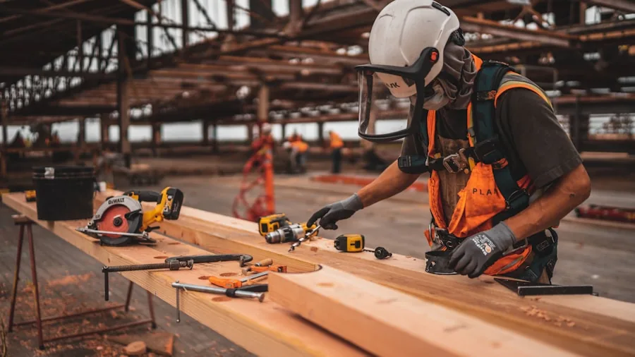 Hilti Launches PM 50MG Multi-Line Laser: What Professional Builders Need to Know 3 construction worker with measuring tool indoors