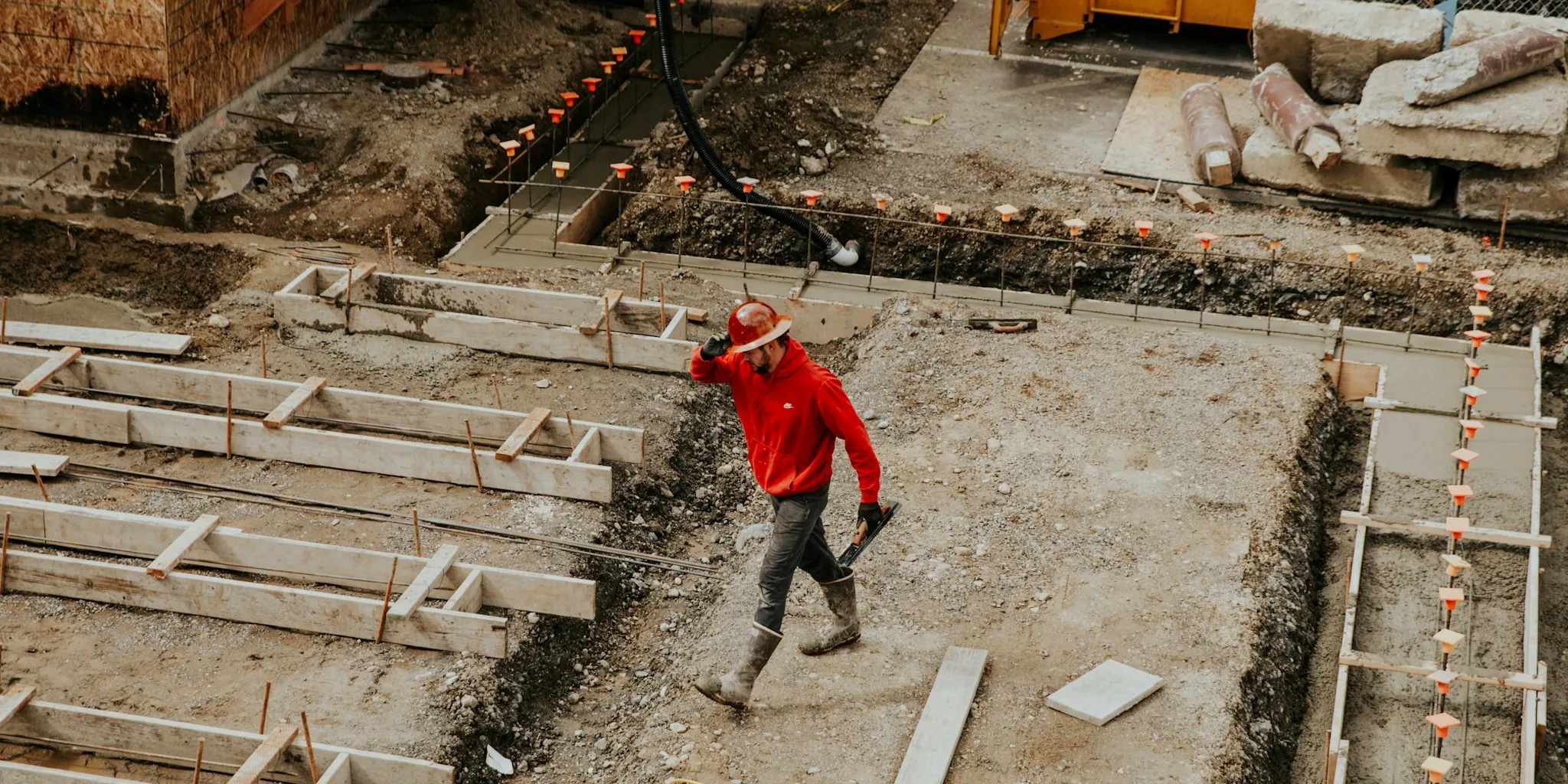 construction workers charging batteries on jobsite