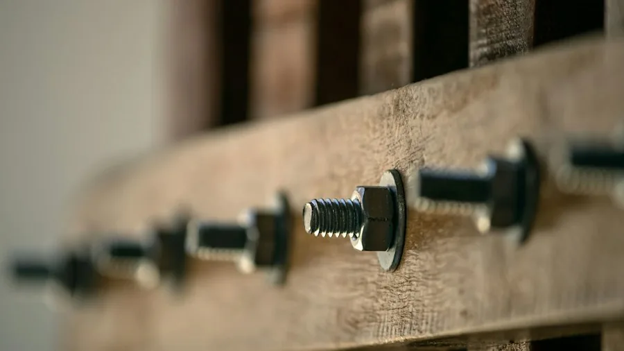 contractor fastening large bolts