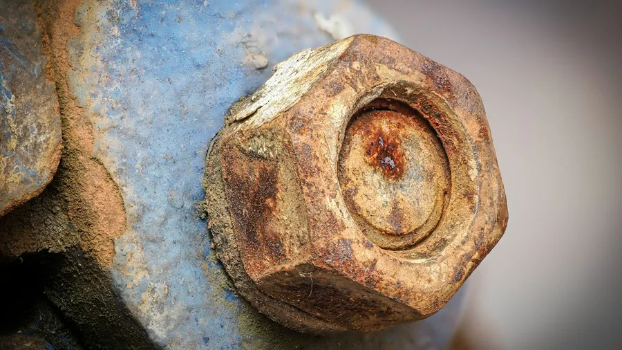 corroded damaged bolt close-up