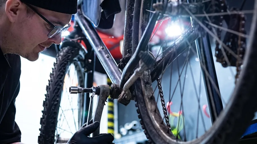 New Ryobi Compact Inflators Deliver High Pressure in Small Packages What Shoppers Should Know 2 cyclist checking bike tire pressure