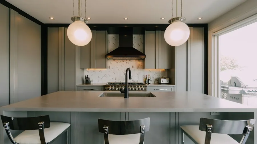 Plastic Bottle Pendant Lights Are a Budget Friendly Trend Shoppers Should Know About 3 decorated pendant light hanging kitchen