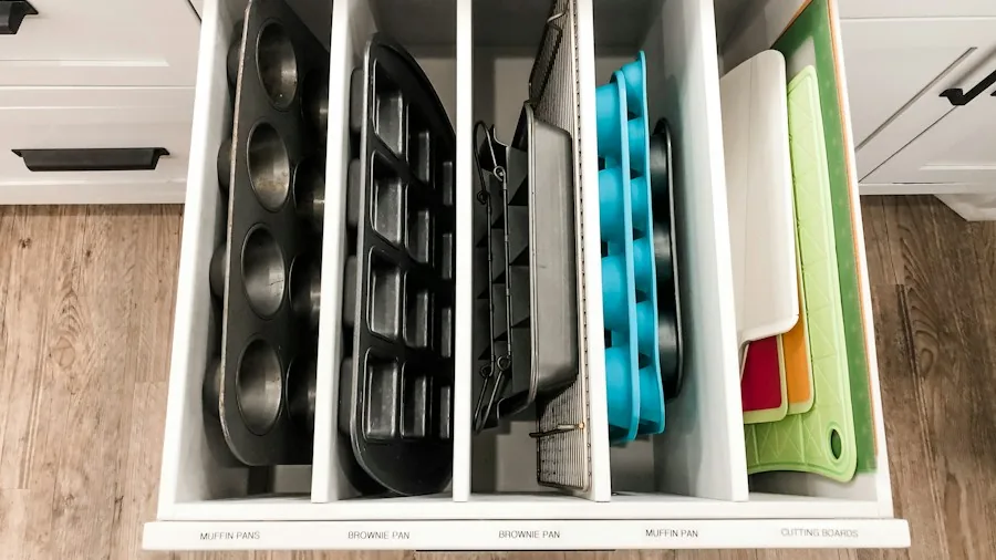 Fall Kitchen Decluttering Guide: What Organizers Say You Should Toss Right Now 2 empty kitchen drawer organization