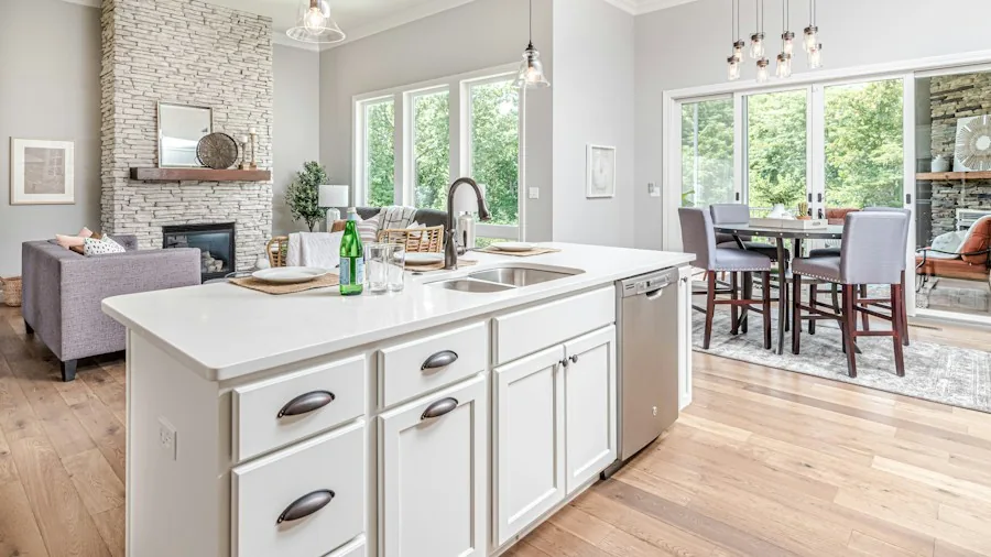 Kitchen Islands with Storage: What Buyers Should Know Before Purchasing 3 family gathering around kitchen island