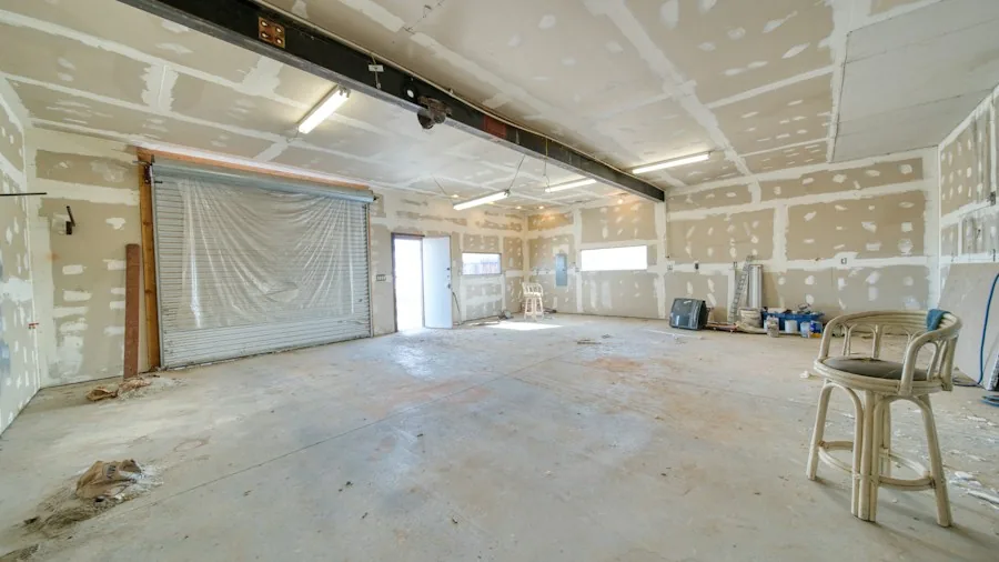 7 Tips to Choose and Install the Right Garage Insulation 3 garage wall studs drywall installation