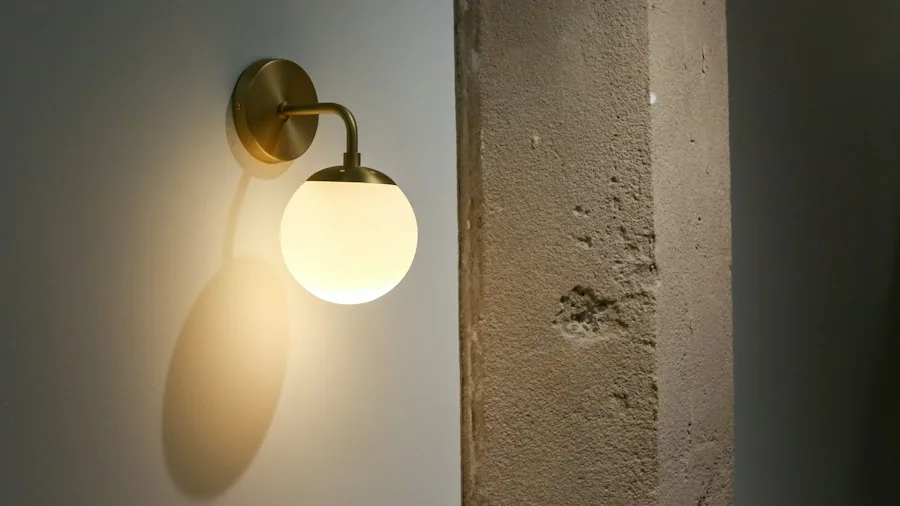 Wall Sconces Replace Table Lamps: What Shoppers Need to Know About This Space Saving Shift 3 gold hardware wall sconce design