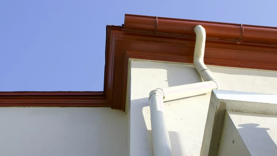 7 Tips for Building a Protective Roof Over Your Garage Opening 3 gutter downspout drainage system installation