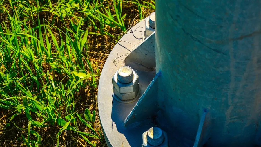 installing steel spike post anchor ground