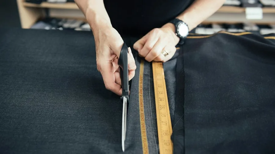 Shower Curtain DIY Project Creates Budget Outdoor Pillows 2 measuring fabric with scissors and ruler