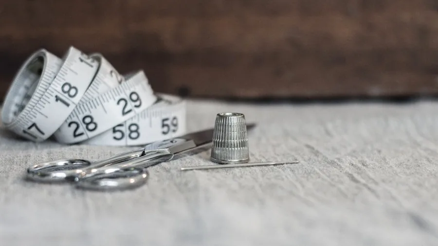 Thrifted Quilts Replace Basic Shower Curtains: What Buyers Should Know About This Upcycling Trend 2 measuring hemming sewing fabric