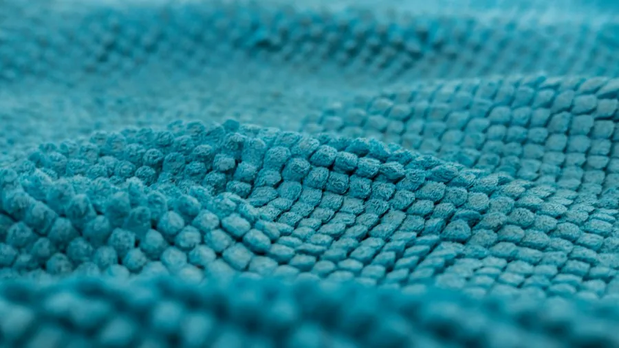 Stainless Steel Appliance Smudges: Why They Happen and How to Fix Them 2 microfiber cloth wiping grain pattern