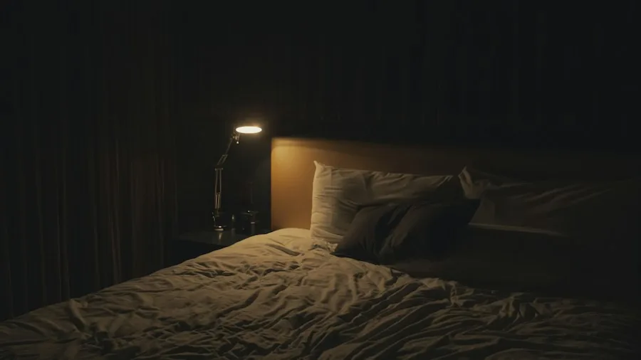 minimal bedroom bedside lighting setup
