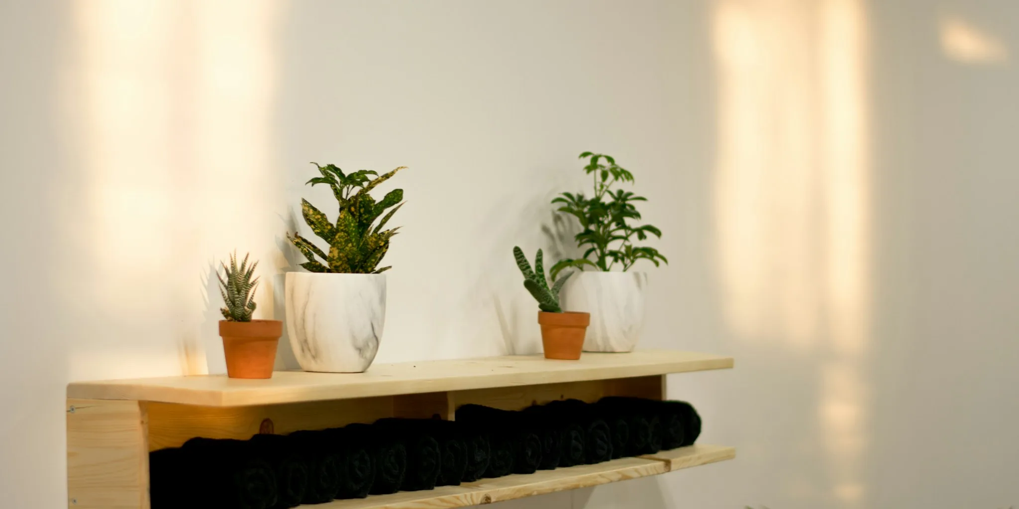 DIY Wood Towel Rack Replaces Builder Grade Fixtures in Your Bathroom