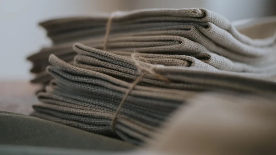 Worn Bathroom Towels Now Belong in Your Compost Bin: What Shoppers Should Know 3 natural fiber towels faded worn