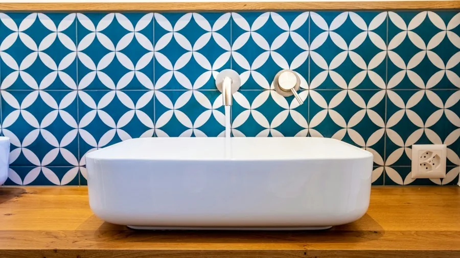 Subway Tiles Are Losing Ground: Art Deco Bathroom Design Takes Over 2 navy blue geometric bathroom tiles