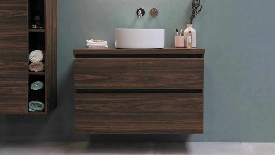 Space-Saving Bathroom Storage Shelves Take Off on Amazon: What Shoppers Need to Know 2 organized bathroom shelves with towels