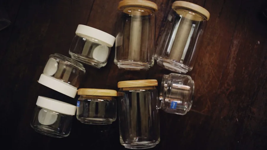 7 Tips for Upcycling Pickle Jars Into Stylish Bathroom Countertop Storage 2 painted glass jars wooden handles