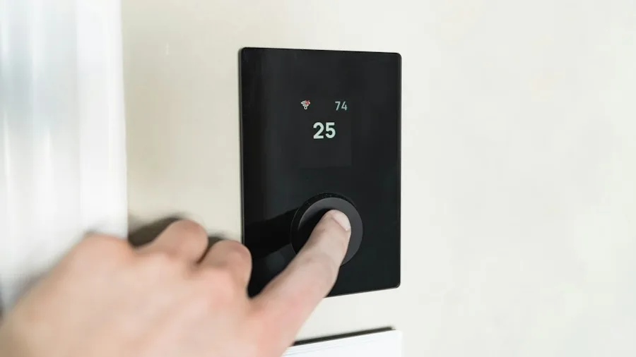 Multi-Function Heater and Air Purifier Sales Signal Shift in How Shoppers Manage Home Climate 3 person adjusting smart home temperature