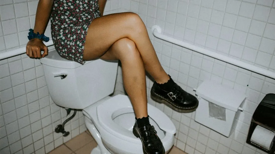 person replacing toilet flapper DIY