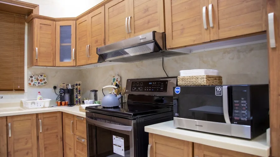 Kitchen Drawer Overhaul Costs $717 and Transforms Spice Storage for Dual Households 2 small kitchen cabinets storage