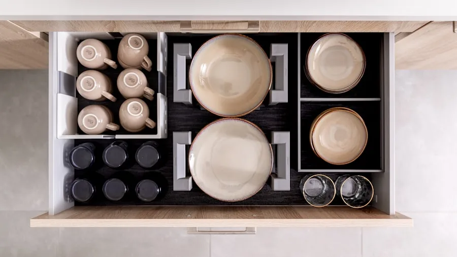 Kitchen Drawer Overhaul Costs $717 and Transforms Spice Storage for Dual Households 3 spice bottles drawer organization