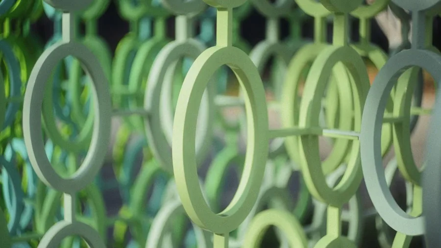 stacked plastic rings being painted