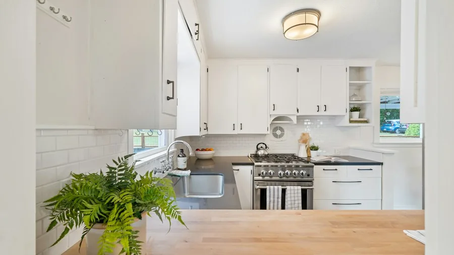 Kitchen Layout Disaster Fixed: What This Designer Transformation Means for Your Home 2 u-shaped kitchen peninsula workspace