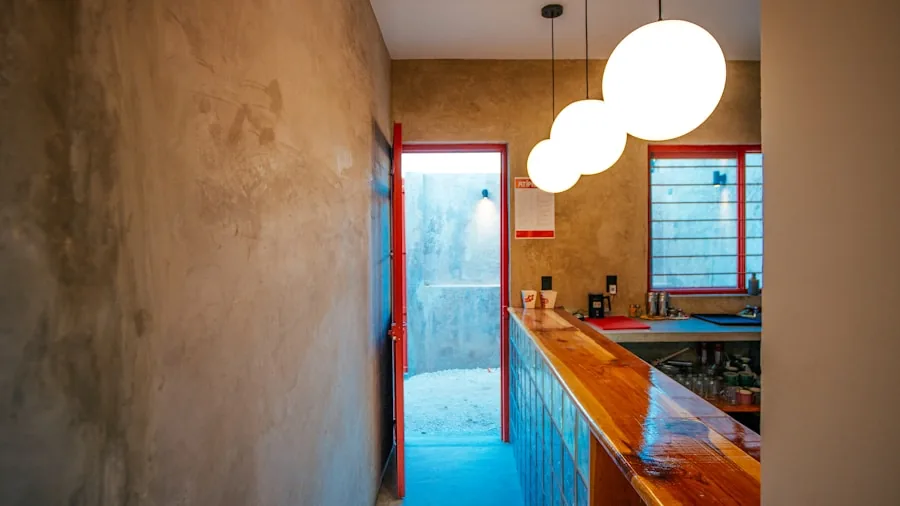 How Homeowners Are Transforming Historic Kitchens With Bold Color and Vintage Style 3 warm kitchen lighting design detail