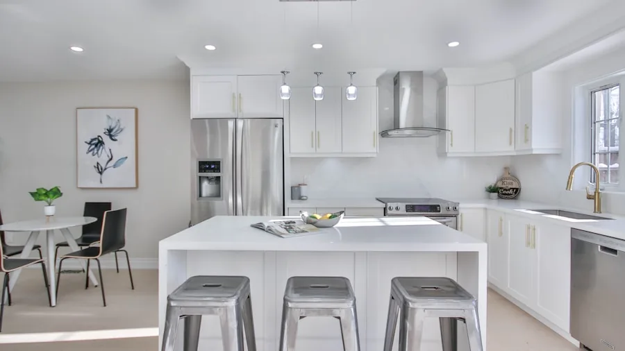 Kitchen Renovation Ideas: How Opening Walls Creates Bigger, Brighter Spaces 2 white kitchen with breakfast bar seating