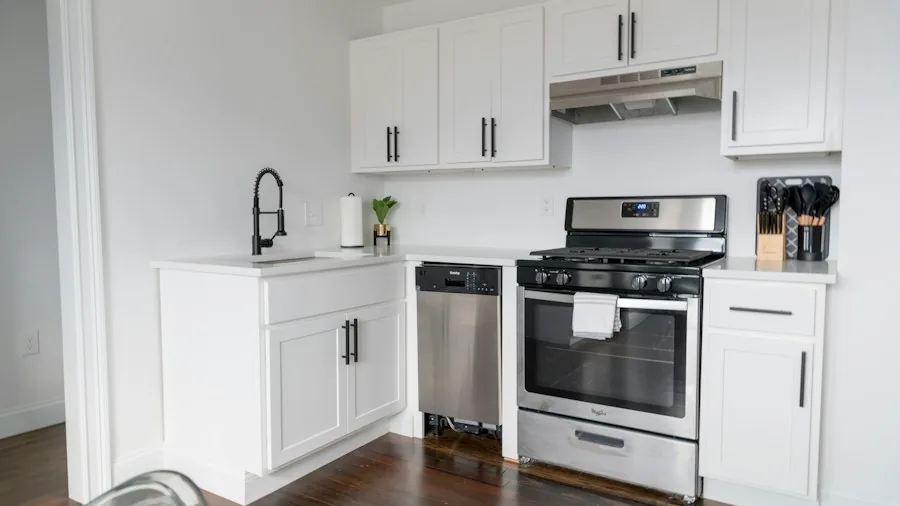wiping stainless steel appliance
